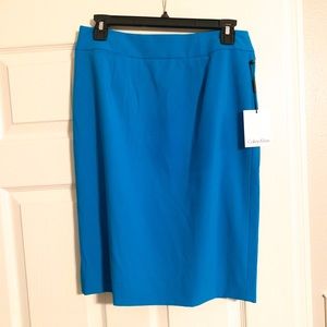 New with tags NWT Calvin Klein pencil skirt. Size 4. Turquoise. Gorgeous.